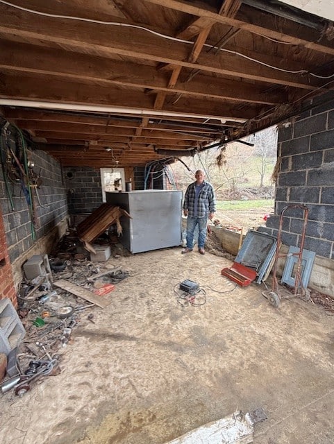 Photo of Gene in his barn damaged by Hurricane Helene.