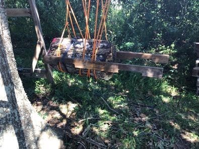 outriggers attached to the bee log. 