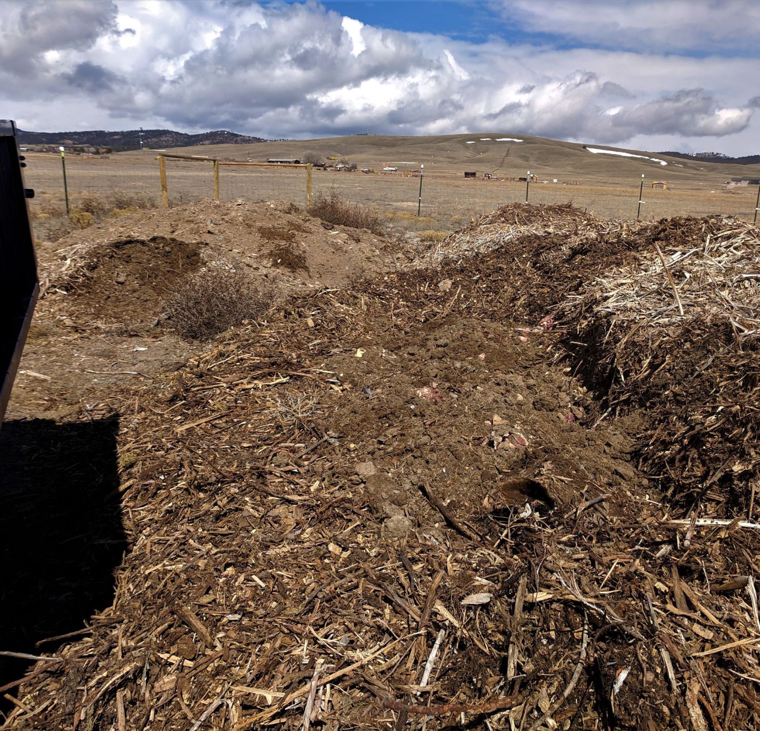 Starting to cover waste with woodchips. 