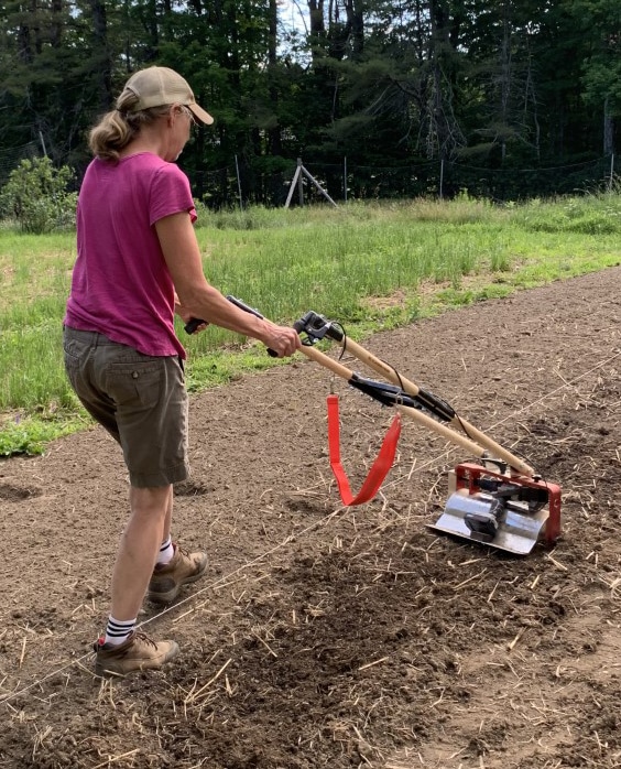 Man walking behind Drill-powered Iconoclast tool 