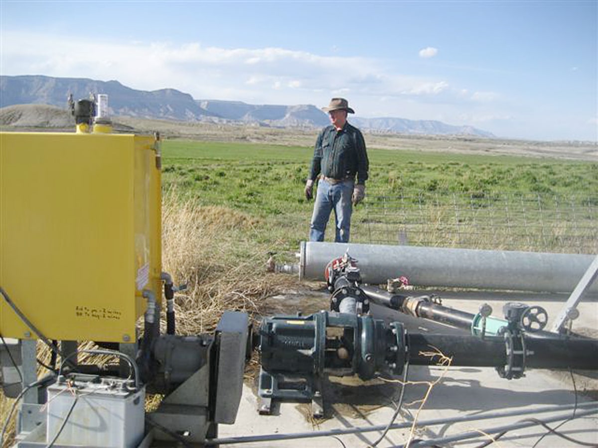 Roger Barton in front of turbine