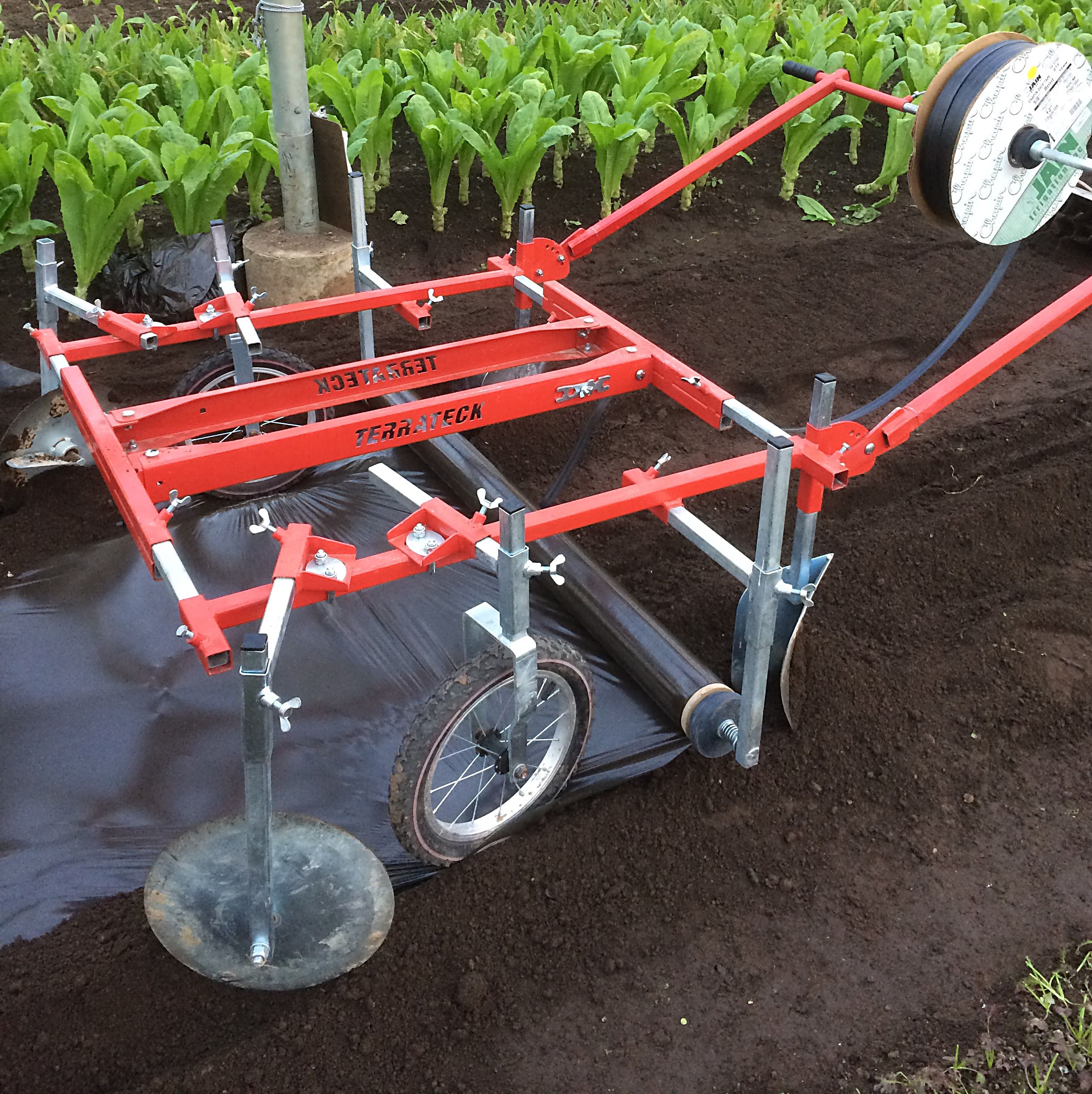 Terrateck manual plastic-mulch layer.