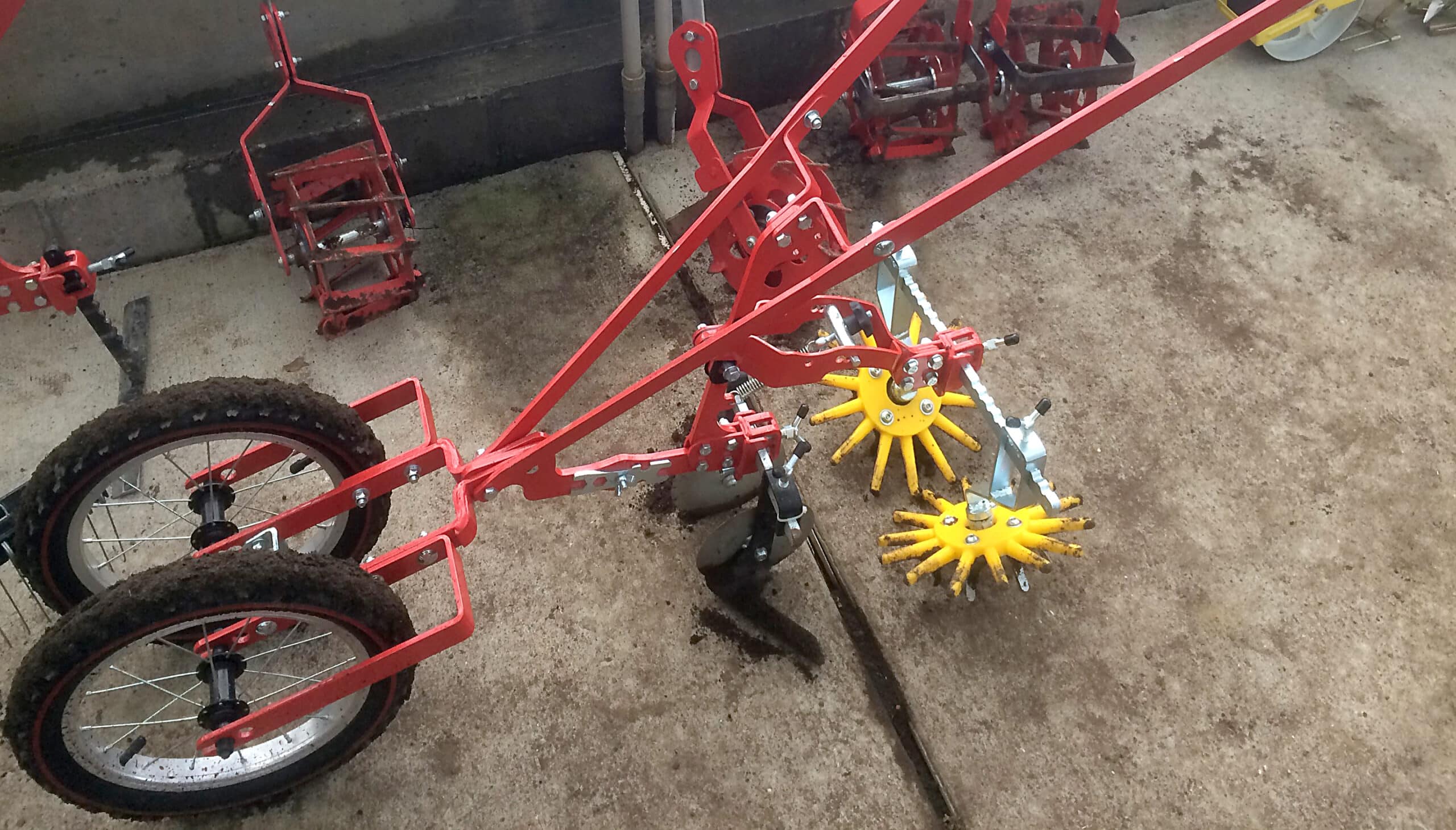 Terrateck wheel hoe with attachments. 