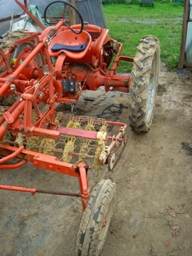 A basket weeder belly mounted to an Allis Chalmers Gat Pennypack Farm and Education Center in Horsham, Pennsylvania.
