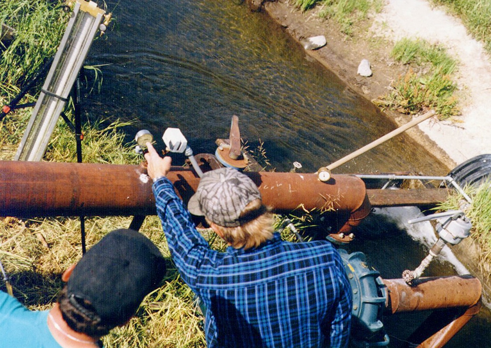 Man checking a pressure gauge