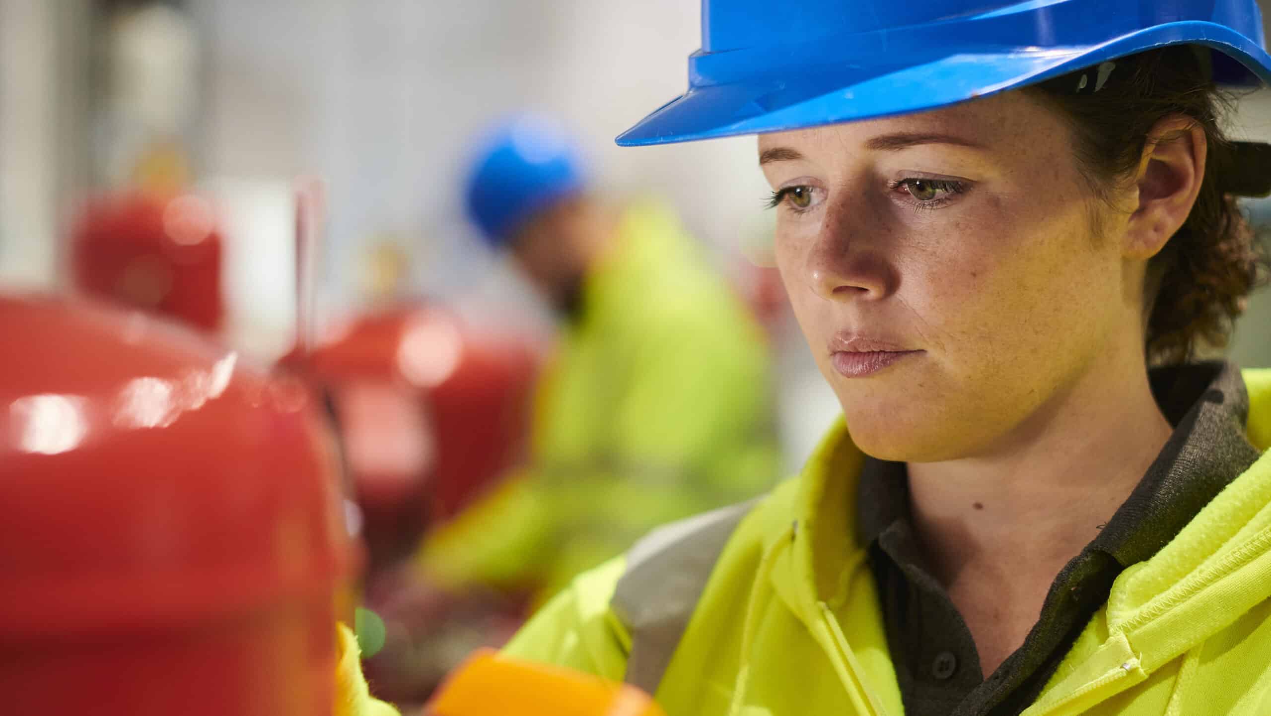 female electrical engineer in the plant room